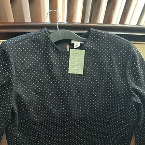 Black dress shirt covered in small rhinestones